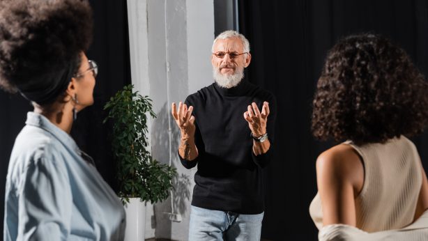 Longevity and anti-aging coach guiding a client on healthy aging practices